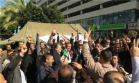 نقابيون فلسطينيون وأردنيون يتضامنون مع إضراب العاملين في 