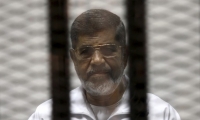 الحكم بالإعدام على محمد مرسي ومحمد بديع 