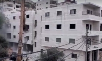 السلطات الاسرائيلية تهدم عمارة من 4 طوابق بالعيساوية