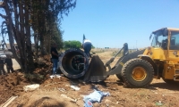  الشرطة ودائرة اراضي اسرائيل تخلي مخازنا وموقف سيارات لمقاولي الحفريات في جلجولية